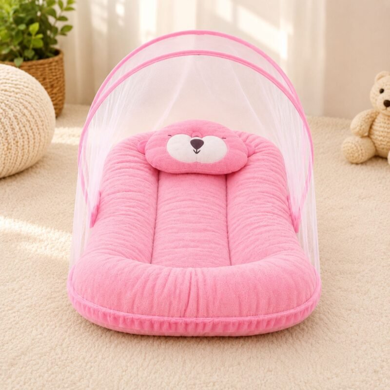 Soft newborn baby bed with mosquito net in pink for comfortable and protected baby sleeping
