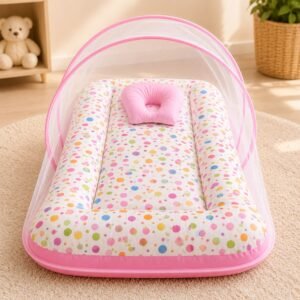 Soft newborn baby bed with mosquito net in pink confetti print for comfortable baby sleeping